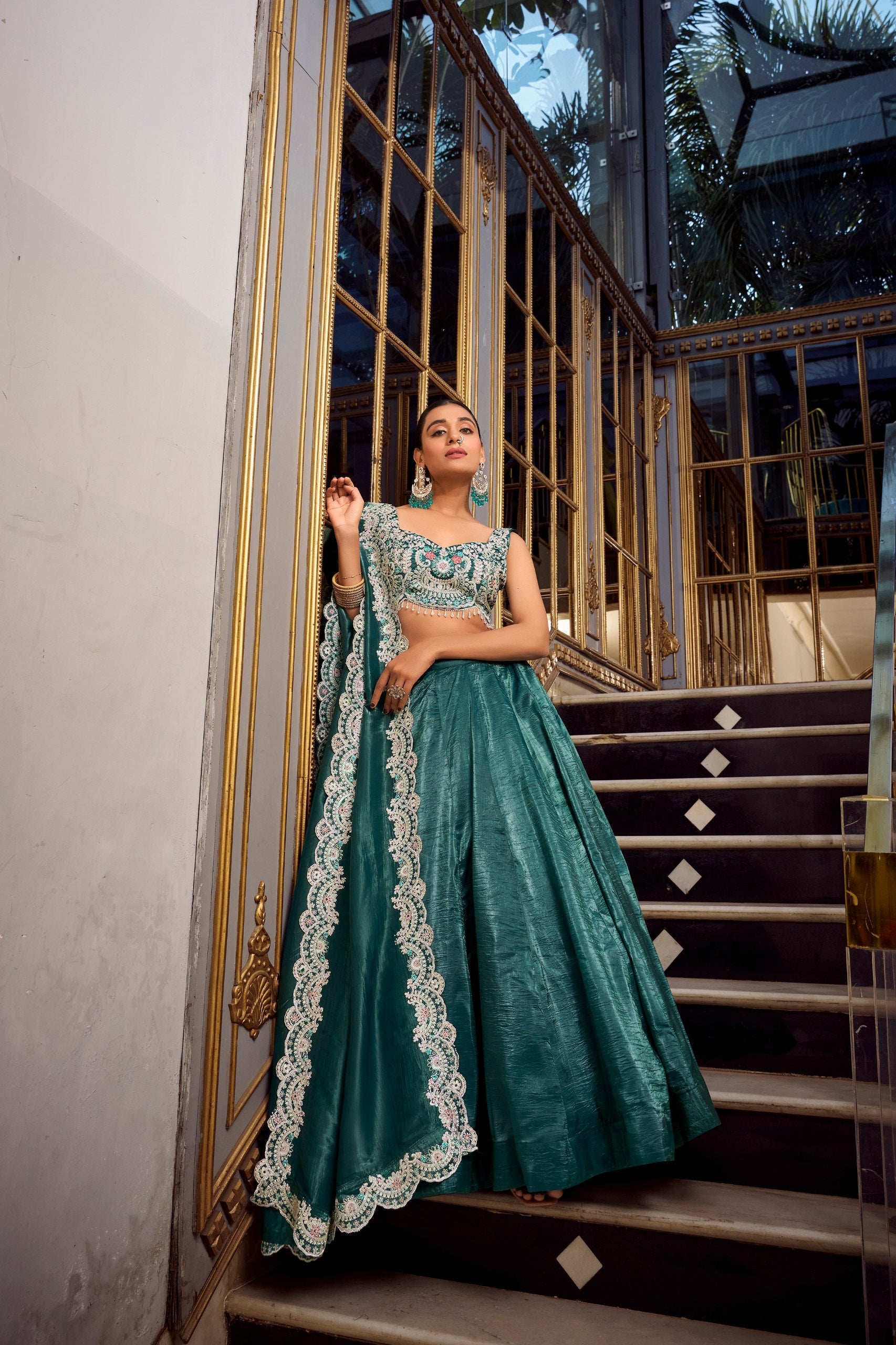 Stunning Teal Color Gold Crush Lehenga With Sequins And Thread Embroidery With Jarkan Diamond Work Blouse